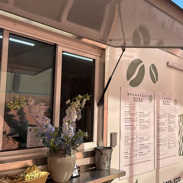 The service window with fresh flowers on the counter